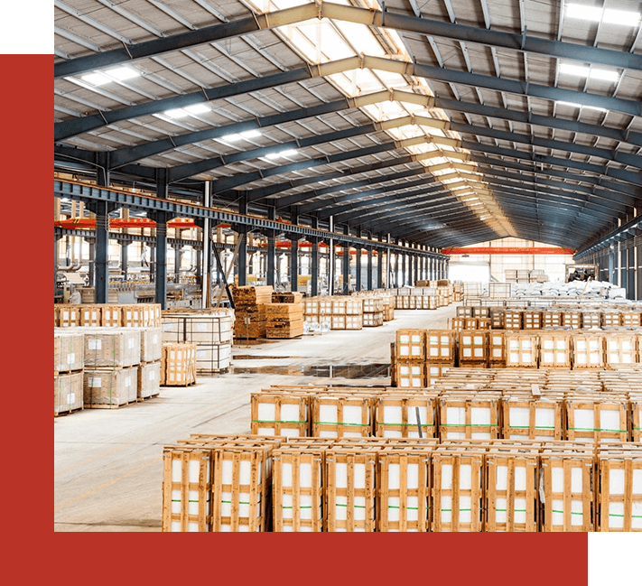 A warehouse filled with boxes and a forklift.